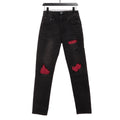 AMIRI Distressed Patch Decorated Denim Trousers