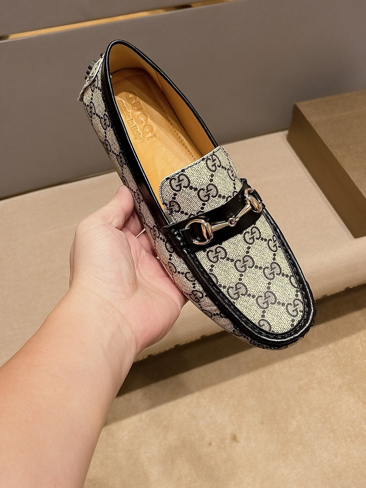 Gucci Beige and Black Gold-Hardware Loafers
